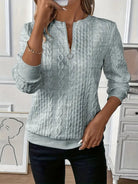 pull femme col zippé torsadé manches longues en gris