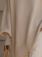 pull femme oversize col rond asymétrique en beige 
