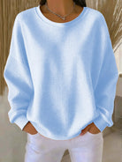 pull femme oversize col rond texturé en bleu ciel