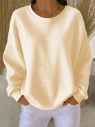 pull femme oversize col rond texturé en abricot