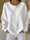 pull femme oversize col rond texturé en blanc