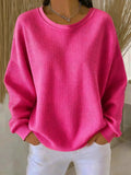 pull femme oversize col rond texturé en rose vif