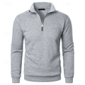 pull homme col zippé col montant en gris