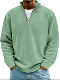pull homme col zippé mi-hauteur coupe ample structuré en vert