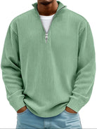 pull homme col zippé mi-hauteur coupe ample structuré en vert