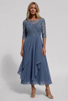 robe femme mi-longue brodée coupe évasée en bleu