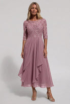 robe femme mi-longue brodée coupe évasée en rose