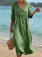 robe femme mi-longue col en v coupe fluide en vert