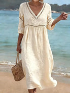 robe femme mi-longue col en v coupe fluide en blanc
