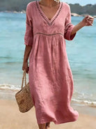 robe femme mi-longue col en v coupe fluide en rose