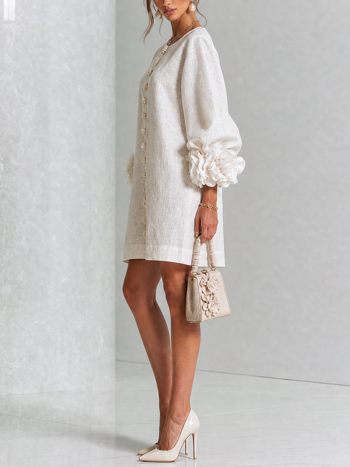 robe femme trapèze manches bouffantes boutons floraux en blanc cassé