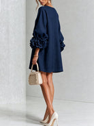robe femme trapèze manches bouffantes boutons floraux en bleu marine