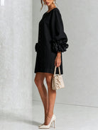 robe femme trapèze manches bouffantes boutons floraux en noir