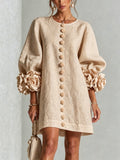 robe femme trapèze manches bouffantes boutons floraux en abricot