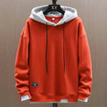 sweat à capuche homme coupe ample en orange