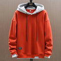 sweat à capuche homme coupe oversize en orange