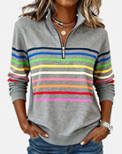 sweat femme col montant zippé rayures colorées en gris
