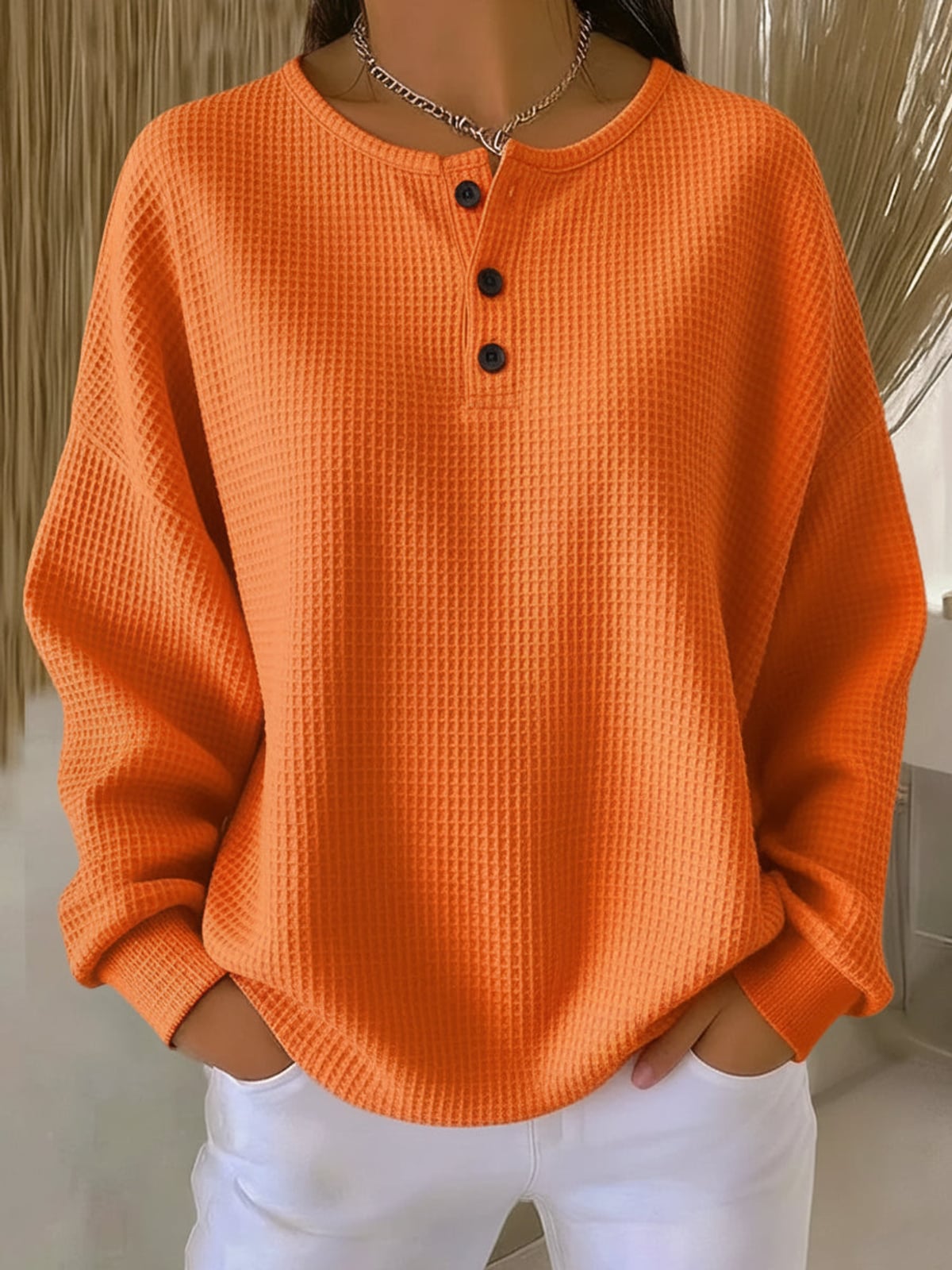 sweat femme oversize col rond boutonné en orange