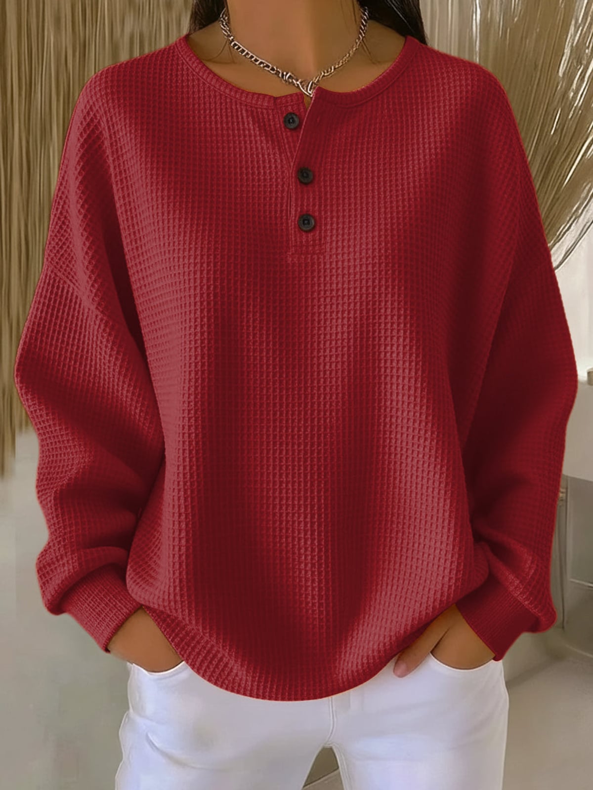 sweat femme oversize col rond boutonné en rouge