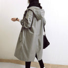 trench femme à capuche longueur genou en gris