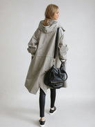 trench femme long à capuche oversize en gris