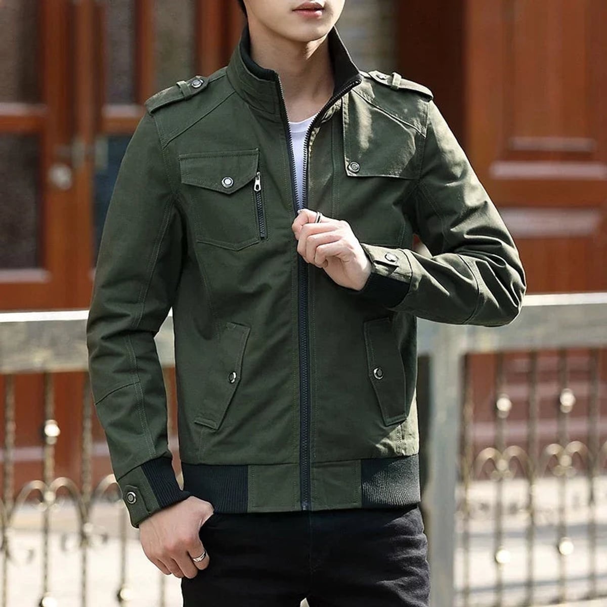 veste homme coupe structurée poches zippées en vert