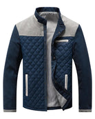 veste homme matelassée col montant empiècements en gris