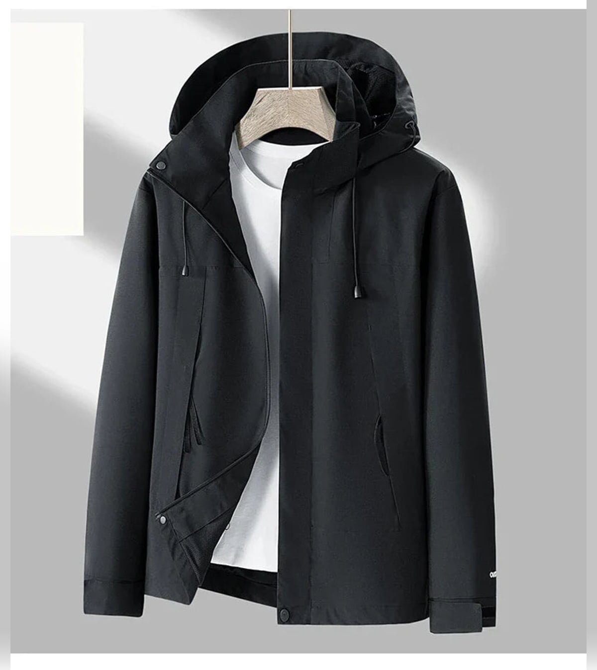 veste homme mi-saison à capuche zippée en noir