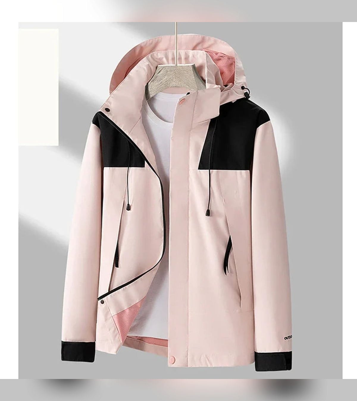 veste homme mi-saison à capuche zippée en rose pâle