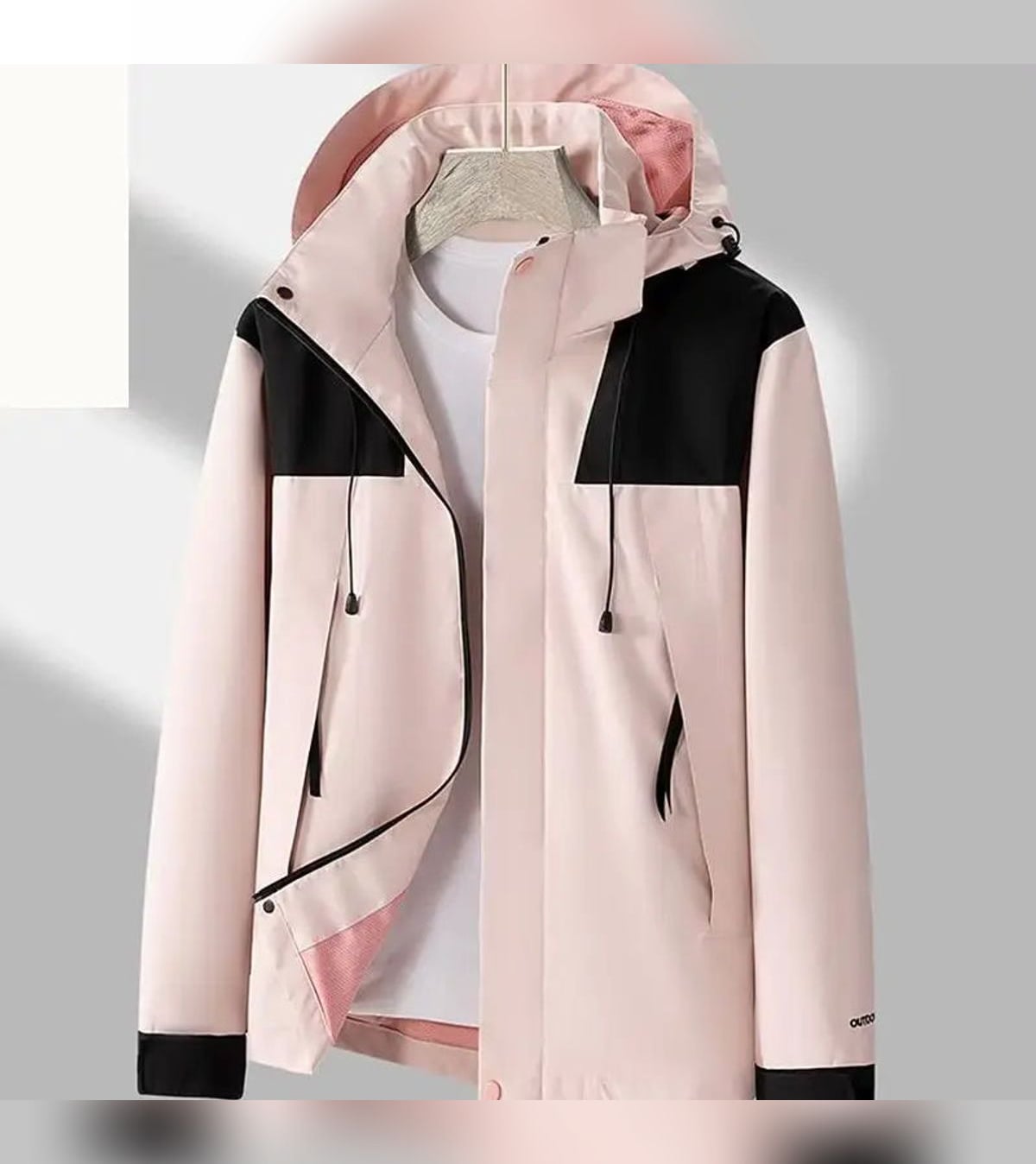 veste homme mi-saison à capuche zippée en rose pâle